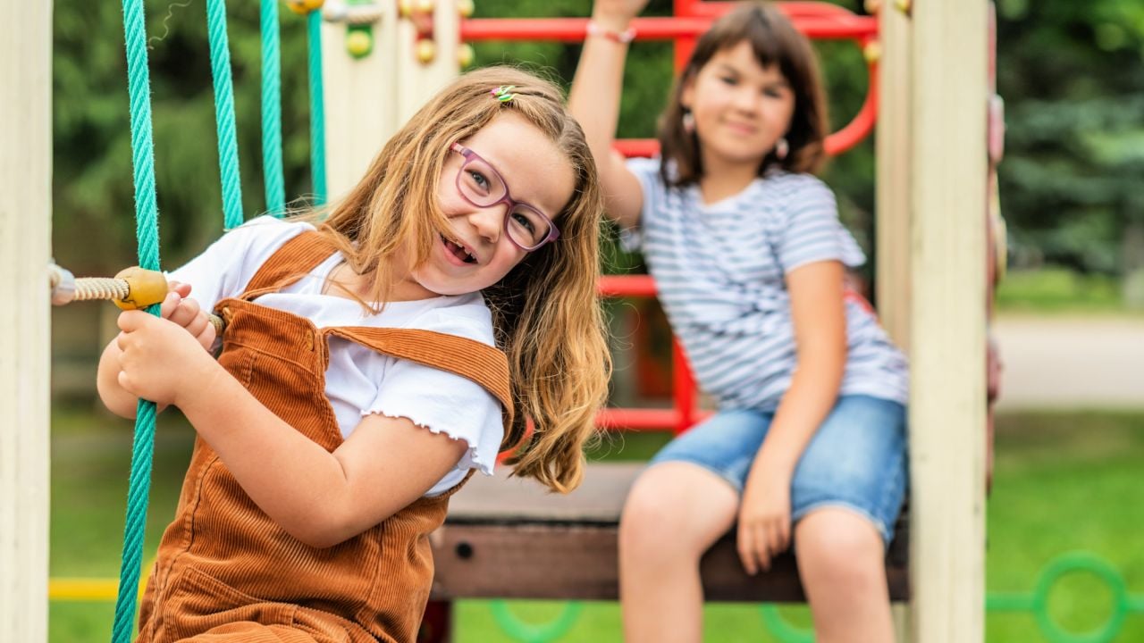 Little girls in playground. 